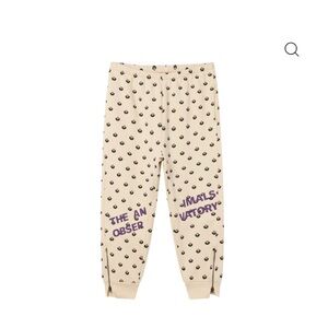 Kids Cream Joggers with Purple Print